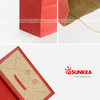 Bolsa de papel kraft impresa personalizada con mango retorcido